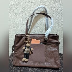 Brown leather texture tote bag with bunny keychain
